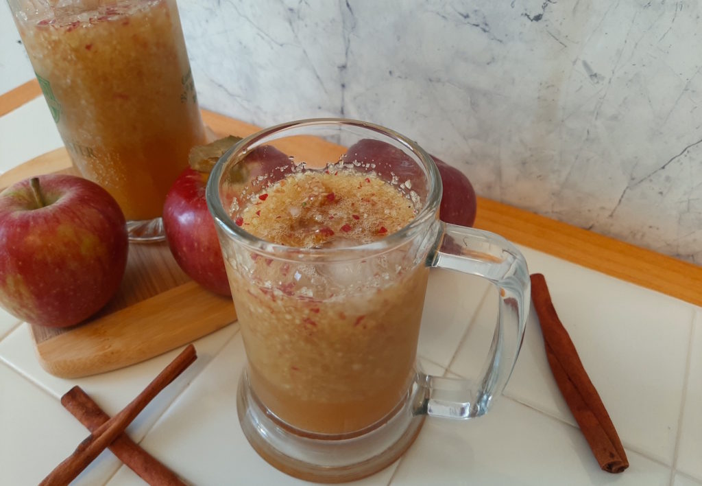 Cinnamon Apple Slushie fall cocktail, winesap apples, wooden cutting board, cinnamon sticks