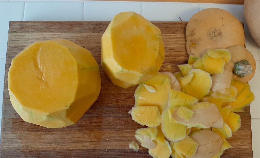 How to cut a butternut squash: peeled and sliced in half.