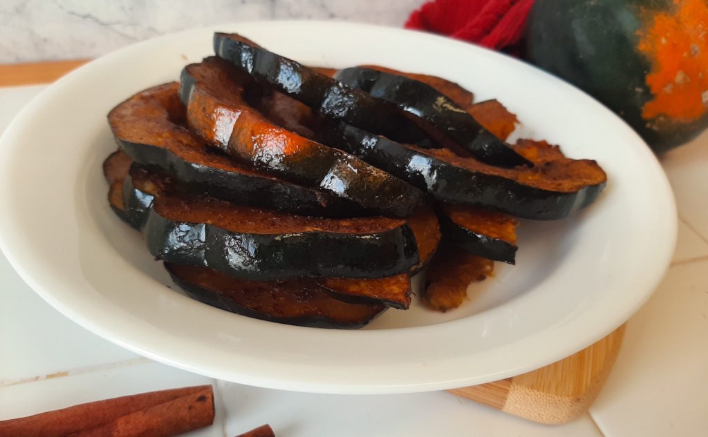 Sliced Acorn squash with Maple Syrup, Butter, Cinnamon, and Cloves.