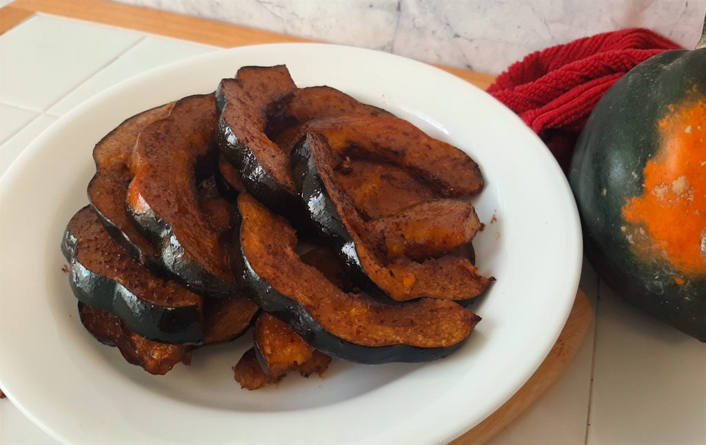 Sliced Acorn squash with Maple Syrup, Butter, Cinnamon, and Cloves.