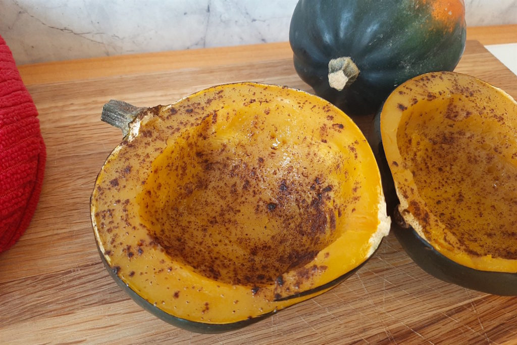 Whole roasted acorn squash with cinnamon and cloves