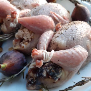 Quail with Salt, Pepper, Thyme, and Olive Oil stuffed with Honey Goat Cheese, Figs, and Walnuts