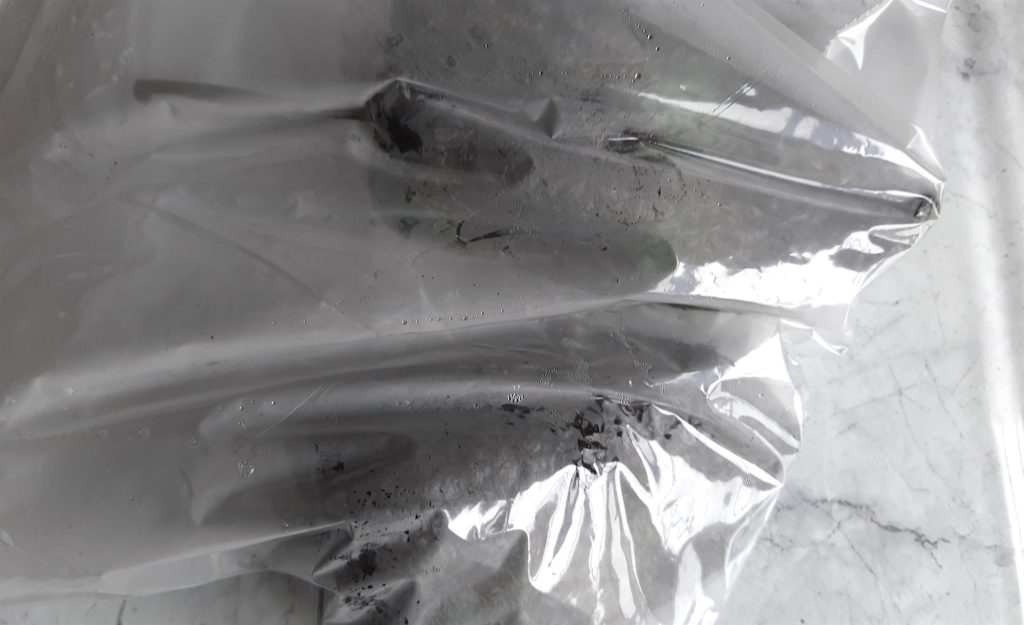 Blackened Poblano Peppers steaming in a plastic bag. Sugar with Spice blog