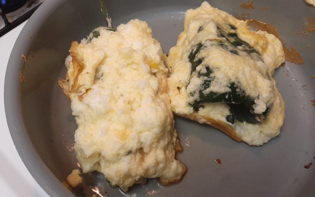 Shrimp and butternut squash stuffed poblano peppers coated in batter frying on the stove. Sugar with Spice Blog