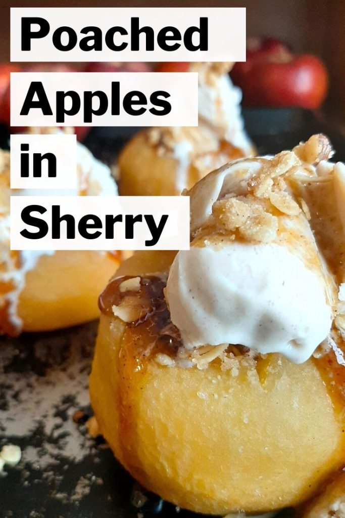 Sherry Poached Apples with Crumb Topping filling and Cinnamon Gelato covered in a sherry glaze on a baking dish with apples in the background. Sugar with Spice Blog.