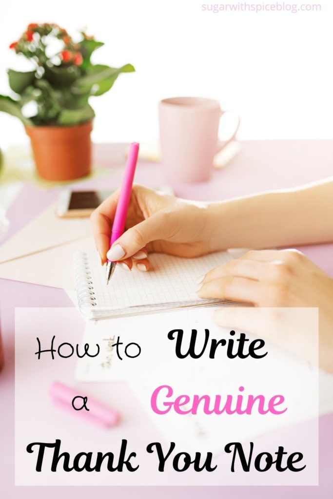 Woman's hand writing on notepad on pink table holding pink pen. Coffee cup, phone, envelope, and flower pot in the background. How to Write a genuine thank you note. Sugar with Spice Blog. Pinterest image.